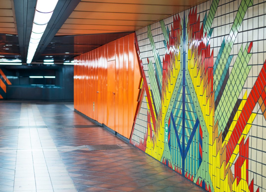 Interior of an underground station in Berlin, Germany. Multicolored walls and no people